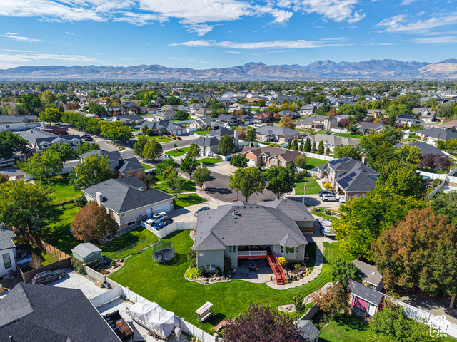 11779 South Stone Ridge Court Ridge West Riverton, UT 84065 - Photo 10 of 85 Spacious residential neighborhood with mature trees, offering mountain scenery in the background