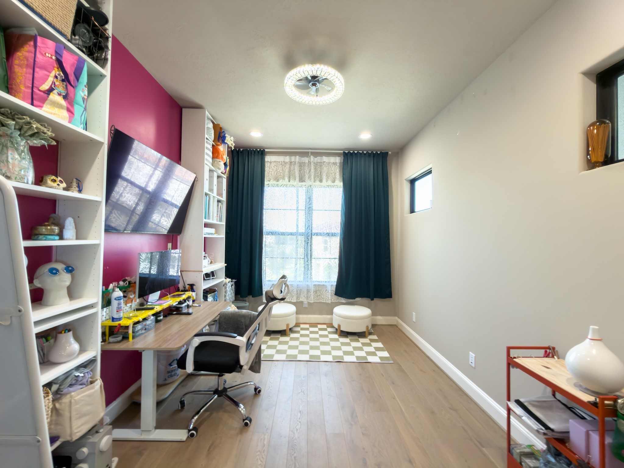 2437 Prairie Hollow Lane Houston, TX 77077 - Photo 12 of 27 a view of a workspace with furniture and a window