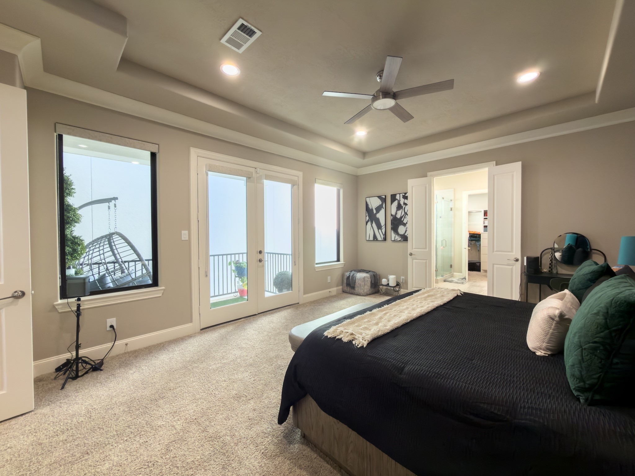 2437 Prairie Hollow Lane Houston, TX 77077 - Photo 15 of 27 a bedroom with a bed and a large window