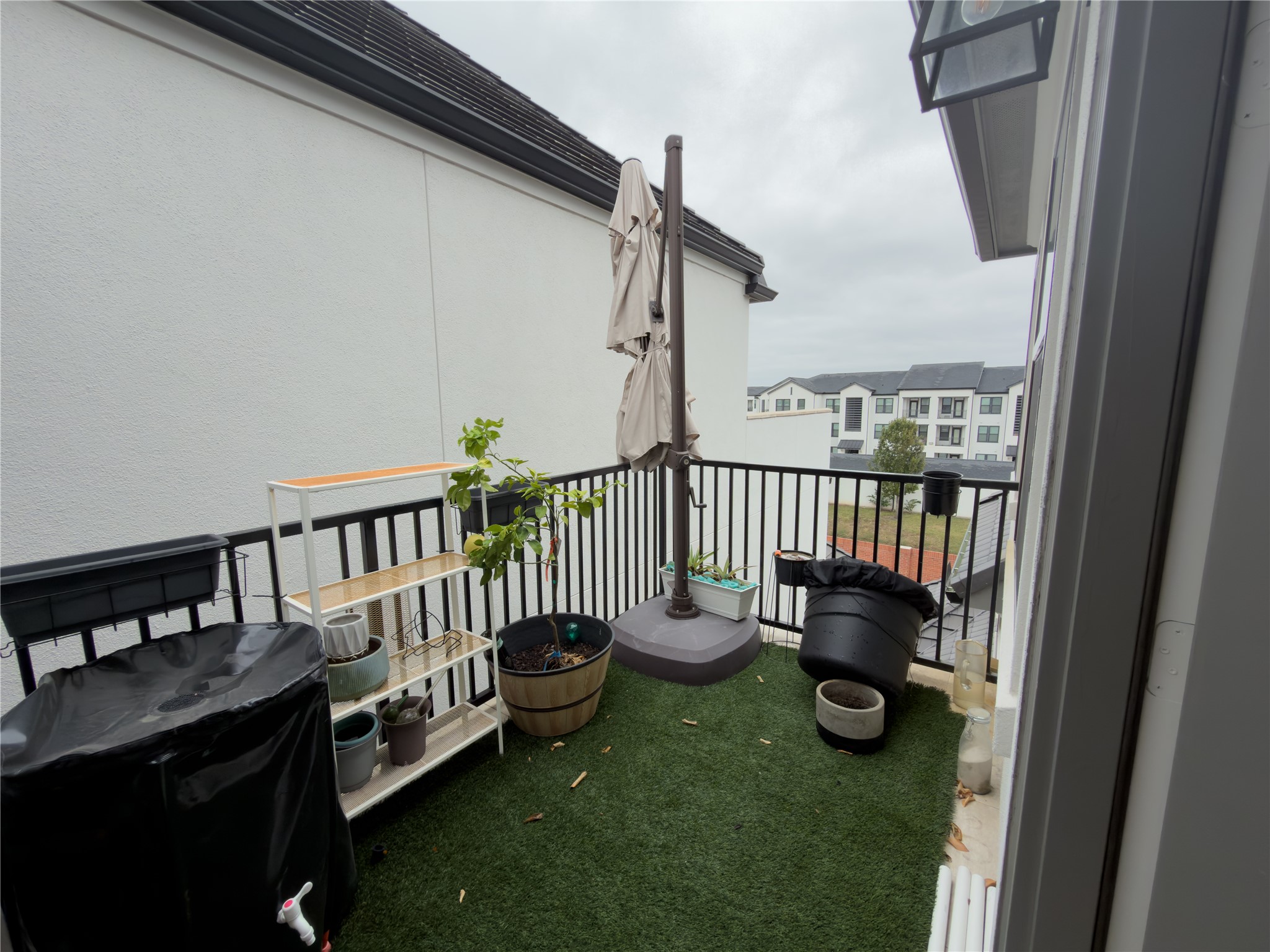 2437 Prairie Hollow Lane Houston, TX 77077 - Photo 24 of 27 Private balcony off of the 3rd floor