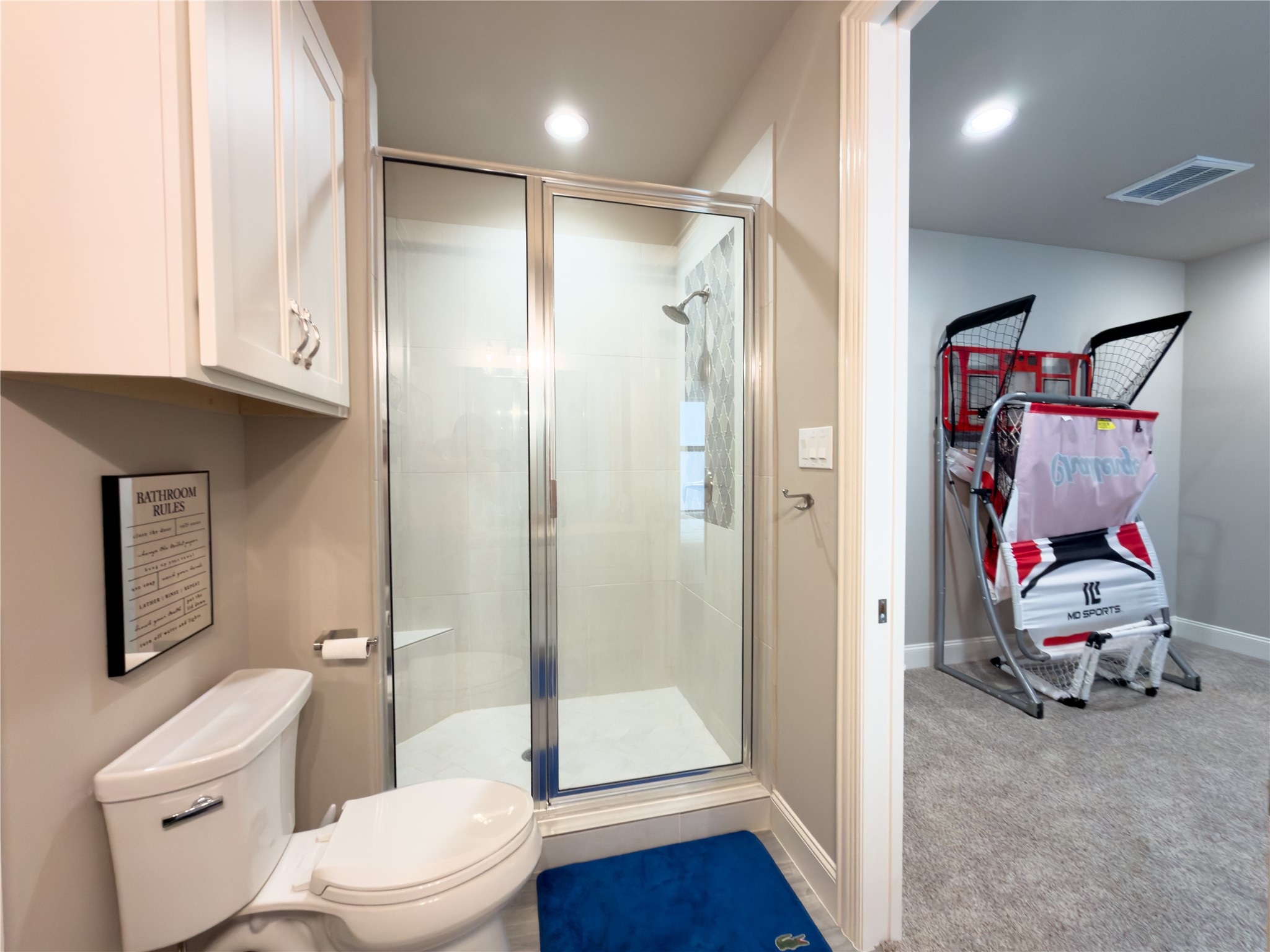 2437 Prairie Hollow Lane Houston, TX 77077 - Photo 26 of 27 a bathroom with a toilet sink and shower