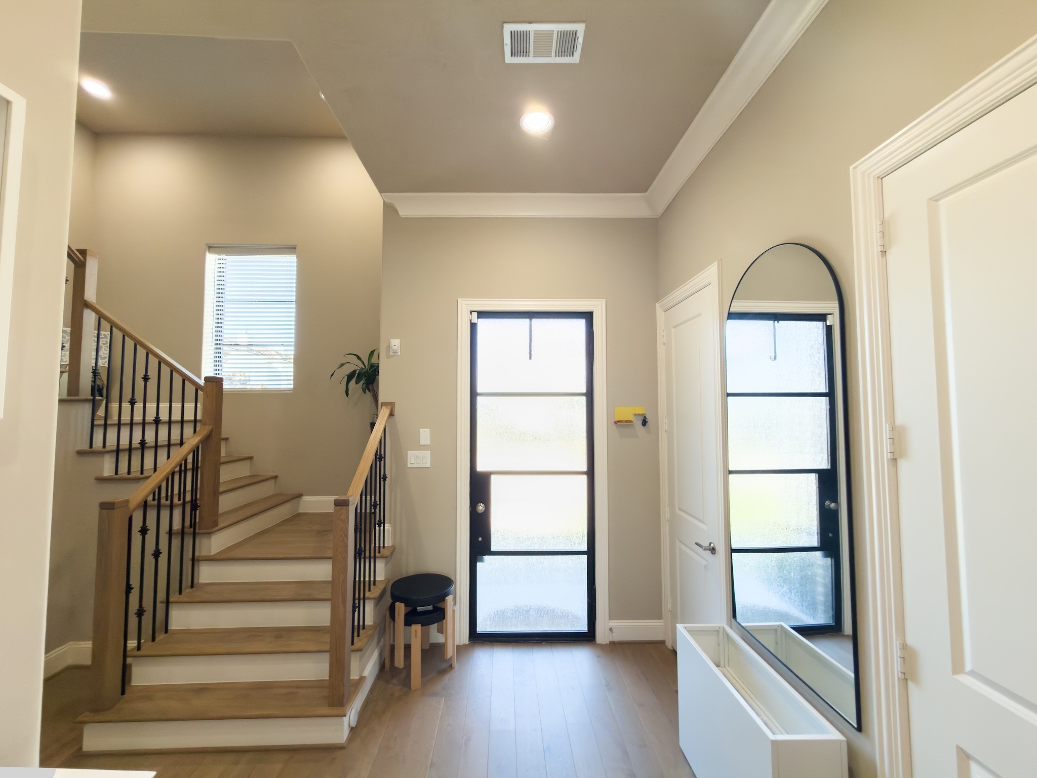 2437 Prairie Hollow Lane Houston, TX 77077 - Photo 8 of 27 a view of a livingroom with wooden floor and windows