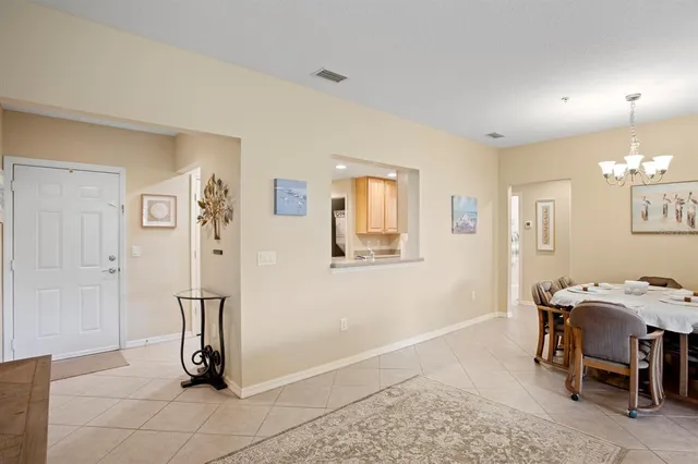 a view of a livingroom with furniture and a window