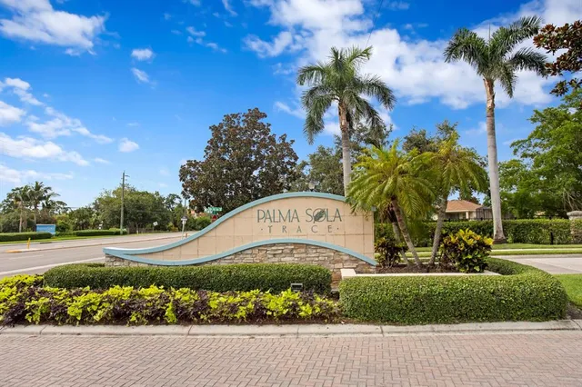 a sign that is on the side of a road