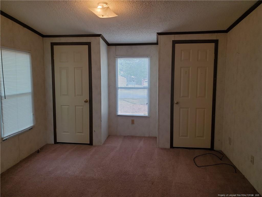 50 Old Forte Trail Spring Lake, NC 28390 - Photo 11 of 20 an empty room with windows