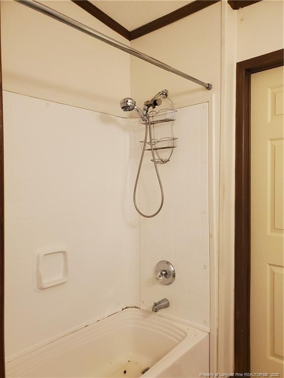 50 Old Forte Trail Spring Lake, NC 28390 - Photo 18 of 20 a bathroom with a bath tub with a shower