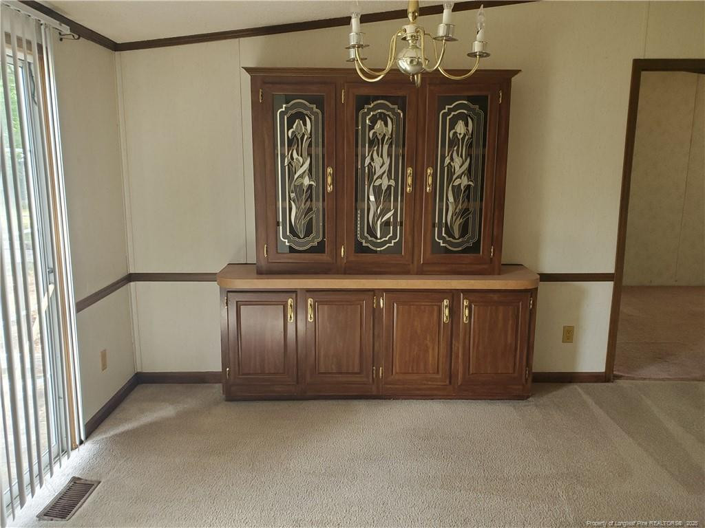 50 Old Forte Trail Spring Lake, NC 28390 - Photo 10 of 20 a view of front door with wooden door