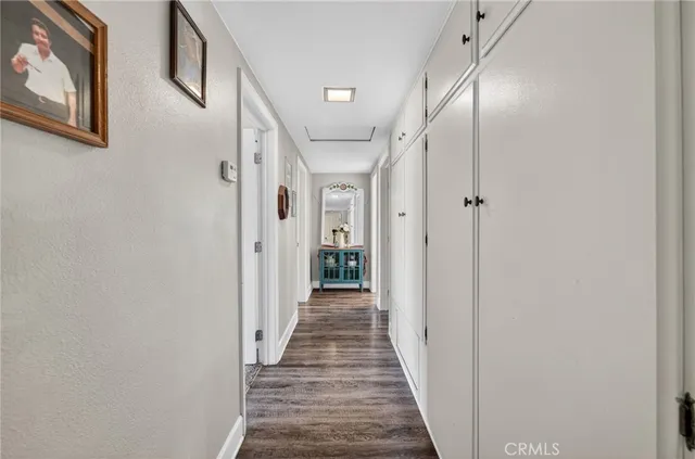 a view of a porch with furniture and garden