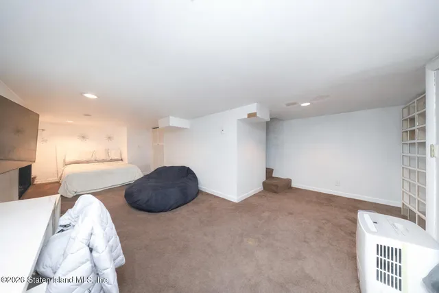 a view of a livingroom with furniture and furniture