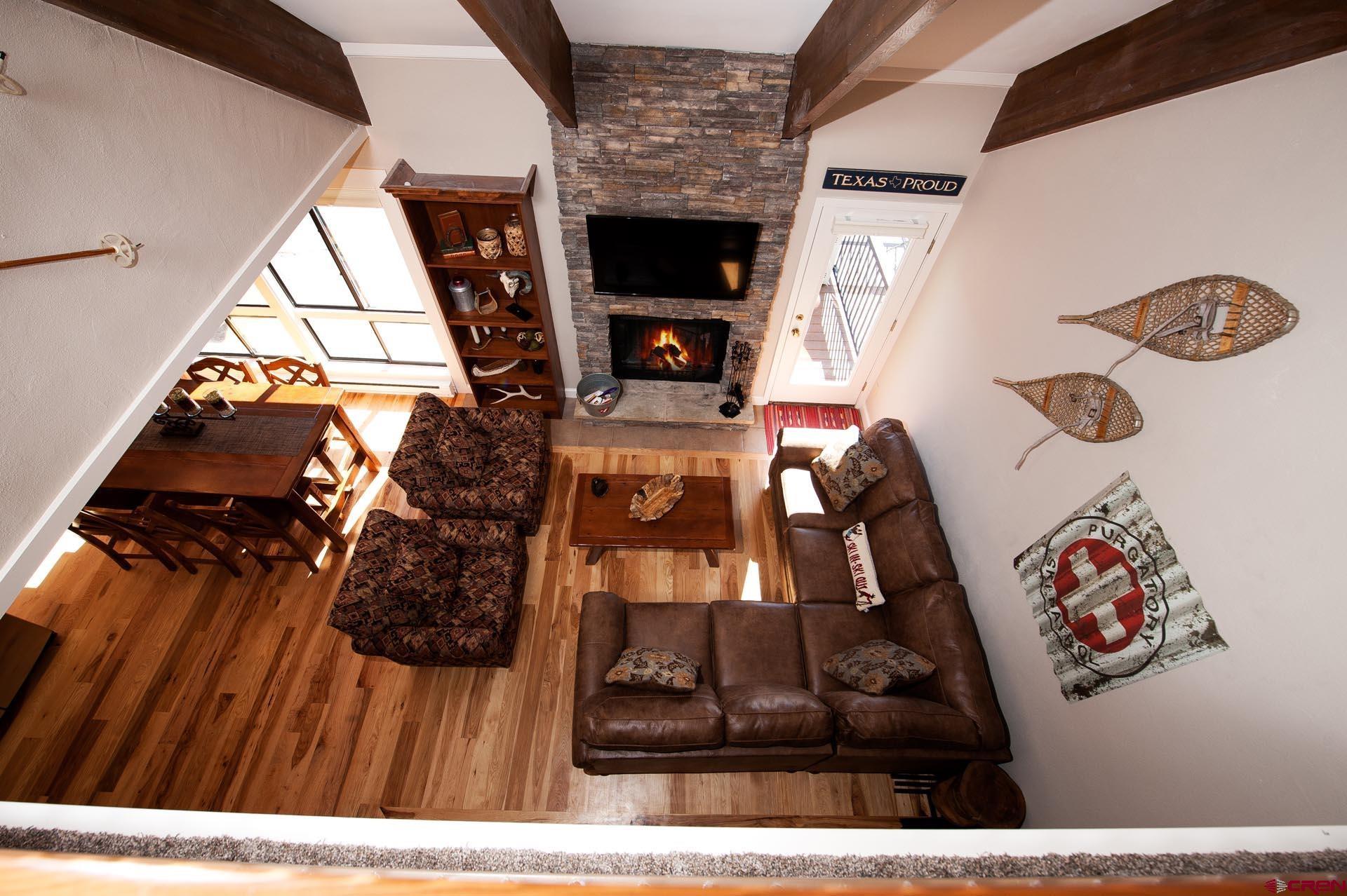 460 Sheol Street, Unit 17 Durango, CO 81301 - Photo 20 of 29 a view of living room with furniture and a fireplace