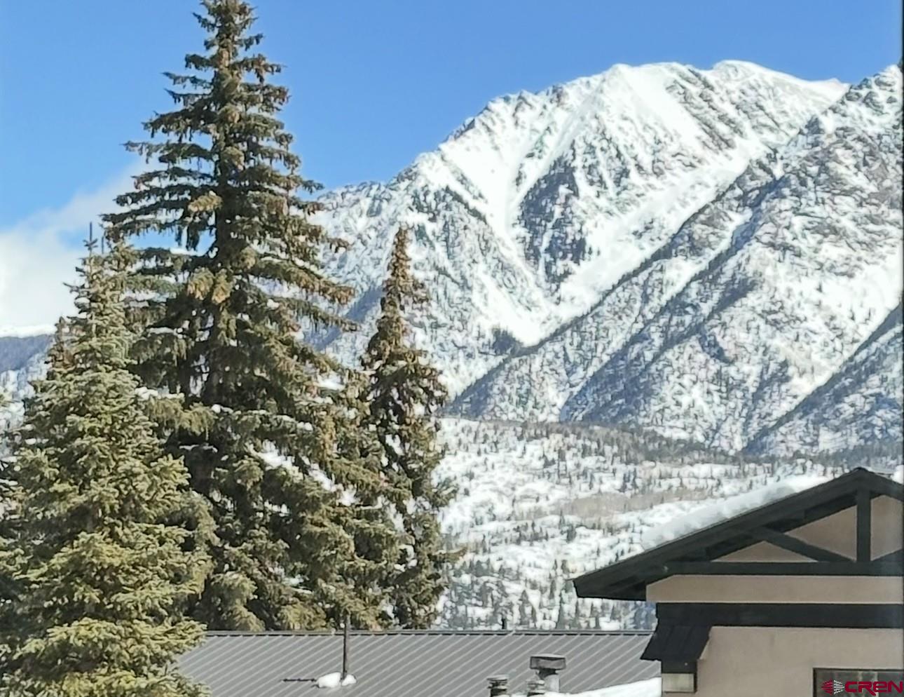 460 Sheol Street, Unit 17 Durango, CO 81301 - Photo 2 of 29 a view of a tree in the middle of a yard
