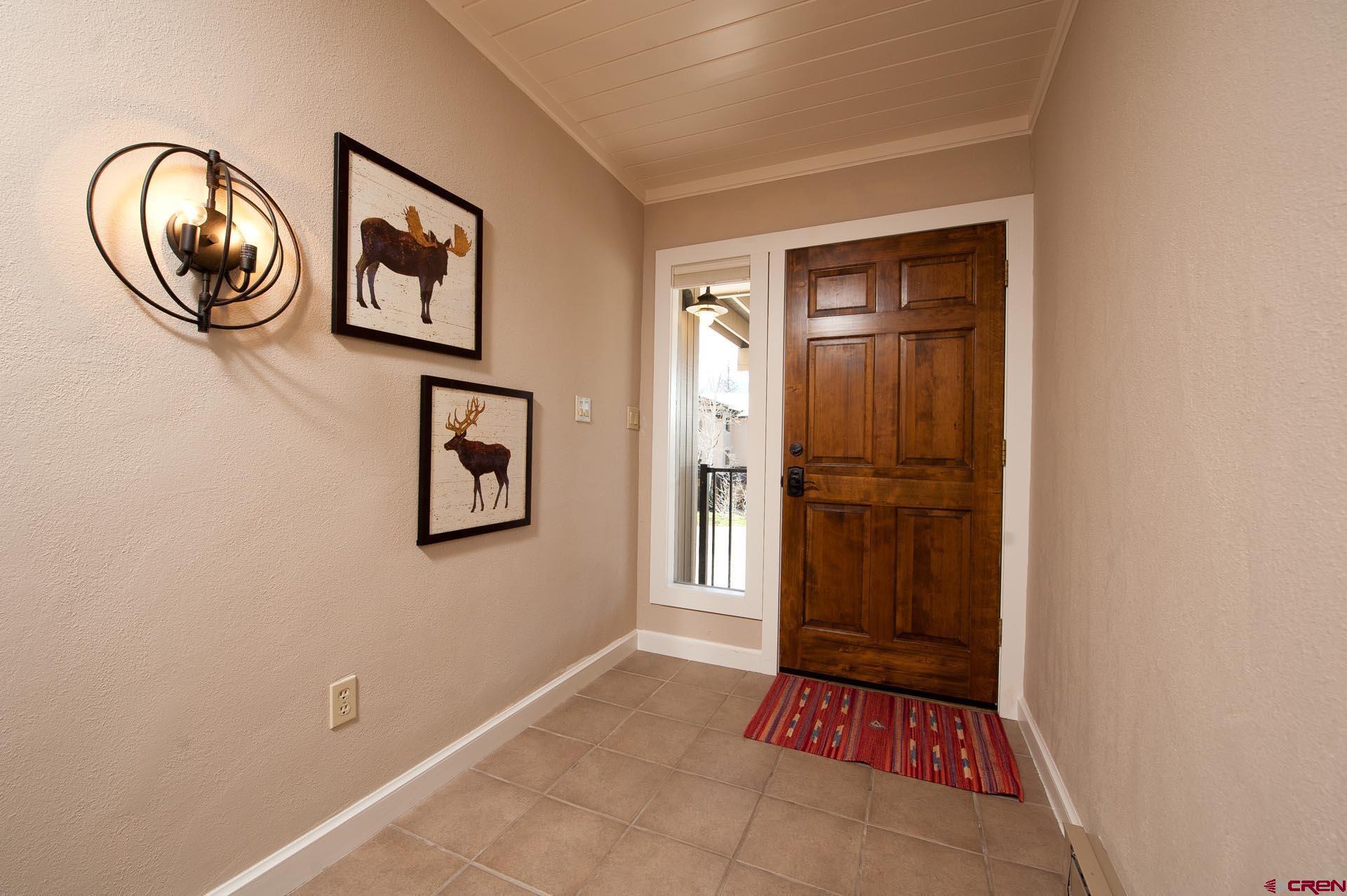 460 Sheol Street, Unit 17 Durango, CO 81301 - Photo 21 of 29 a view of an entryway with wooden floor