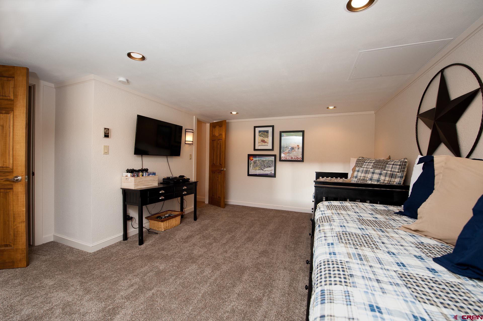 460 Sheol Street, Unit 17 Durango, CO 81301 - Photo 27 of 29 a view of a workspace with furniture and a flat screen tv