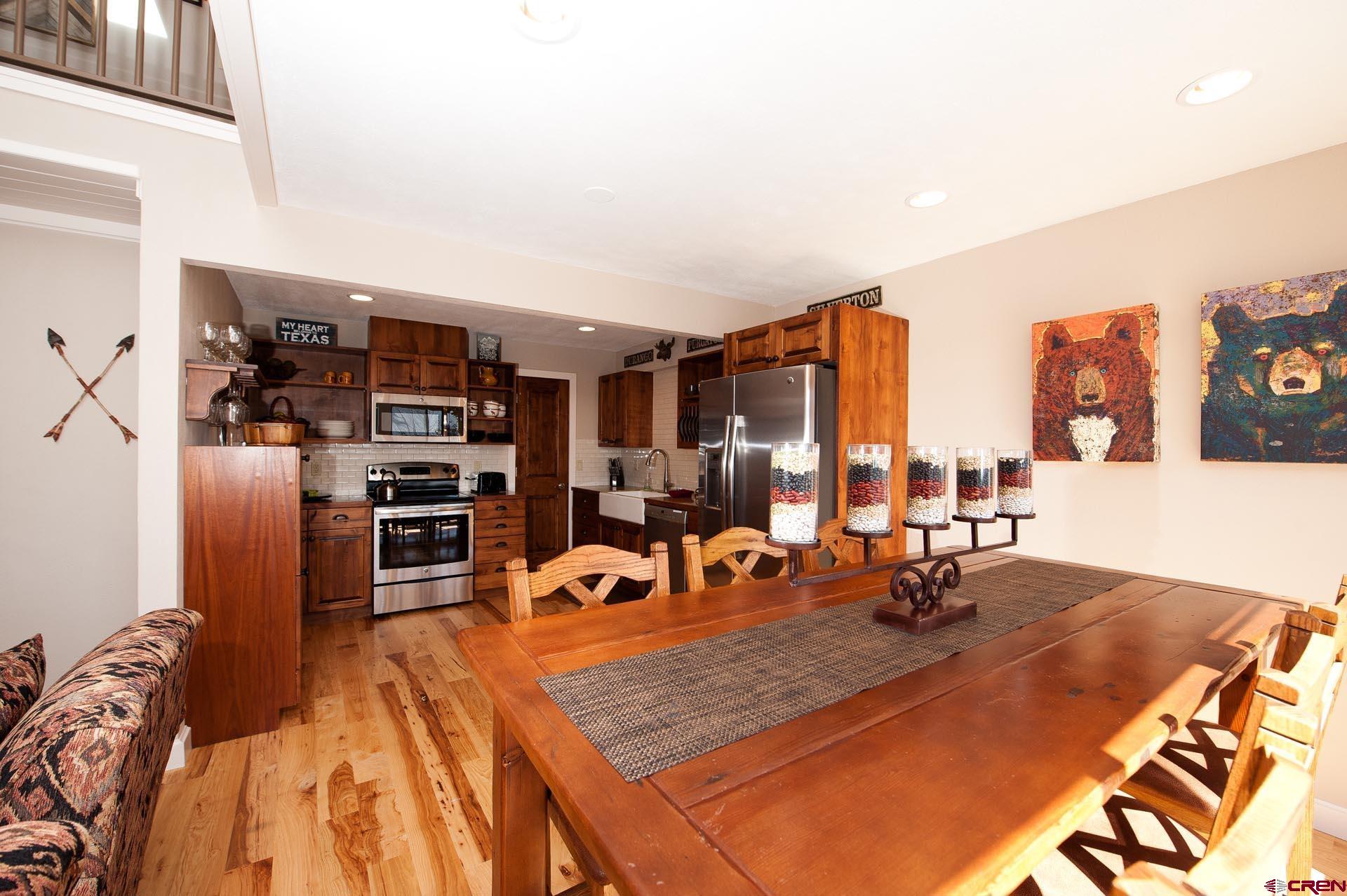 460 Sheol Street, Unit 17 Durango, CO 81301 - Photo 9 of 29 a room with furniture and air hockey table