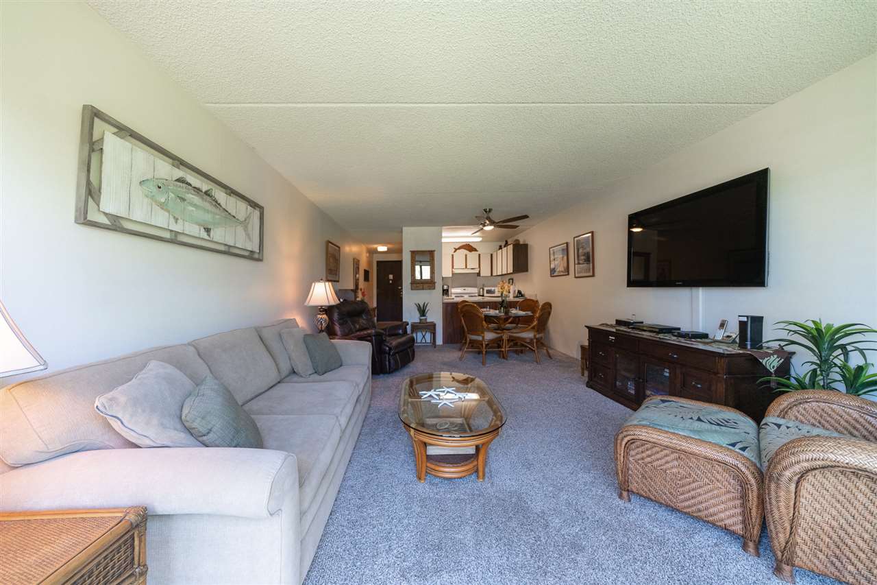 2531 South Kihei Road, Unit DG06 Kihei, HI 96753 - Photo 11 of 16 a living room with furniture and a flat screen tv