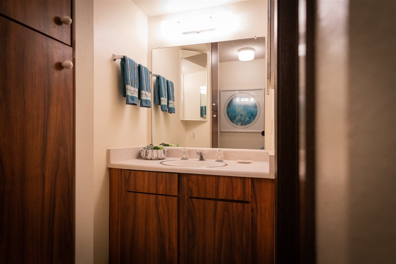 2531 South Kihei Road, Unit DG06 Kihei, HI 96753 - Photo 15 of 16 a bathroom with a double vanity sink and a mirror