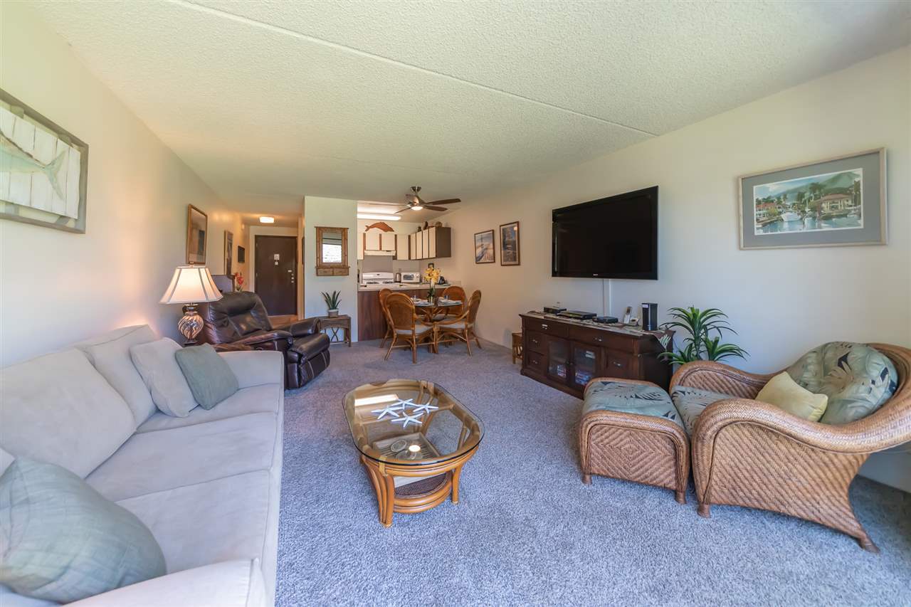 2531 South Kihei Road, Unit DG06 Kihei, HI 96753 - Photo 5 of 16 a living room with furniture and a flat screen tv
