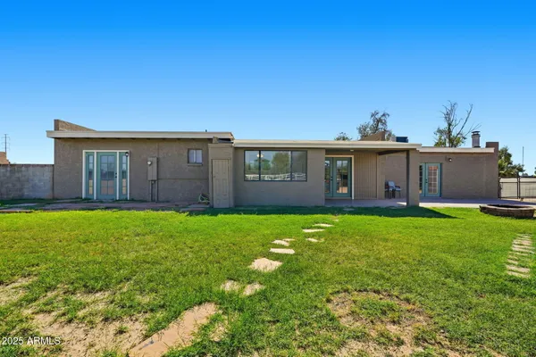 a view of outdoor space with swimming pool