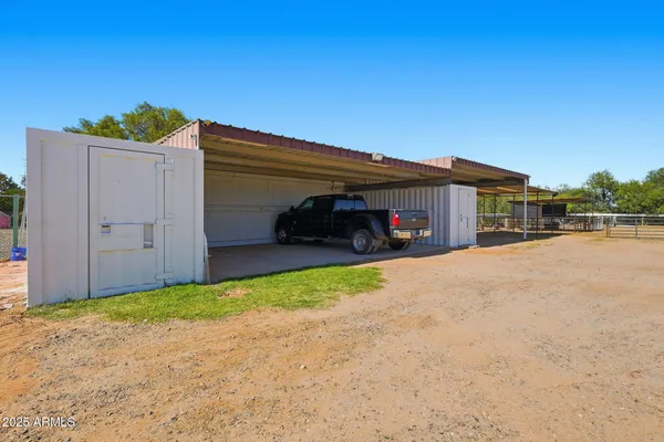 an aerial view of a house with a lake view