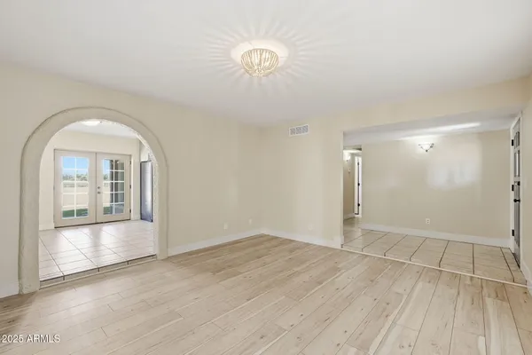 an empty room with windows