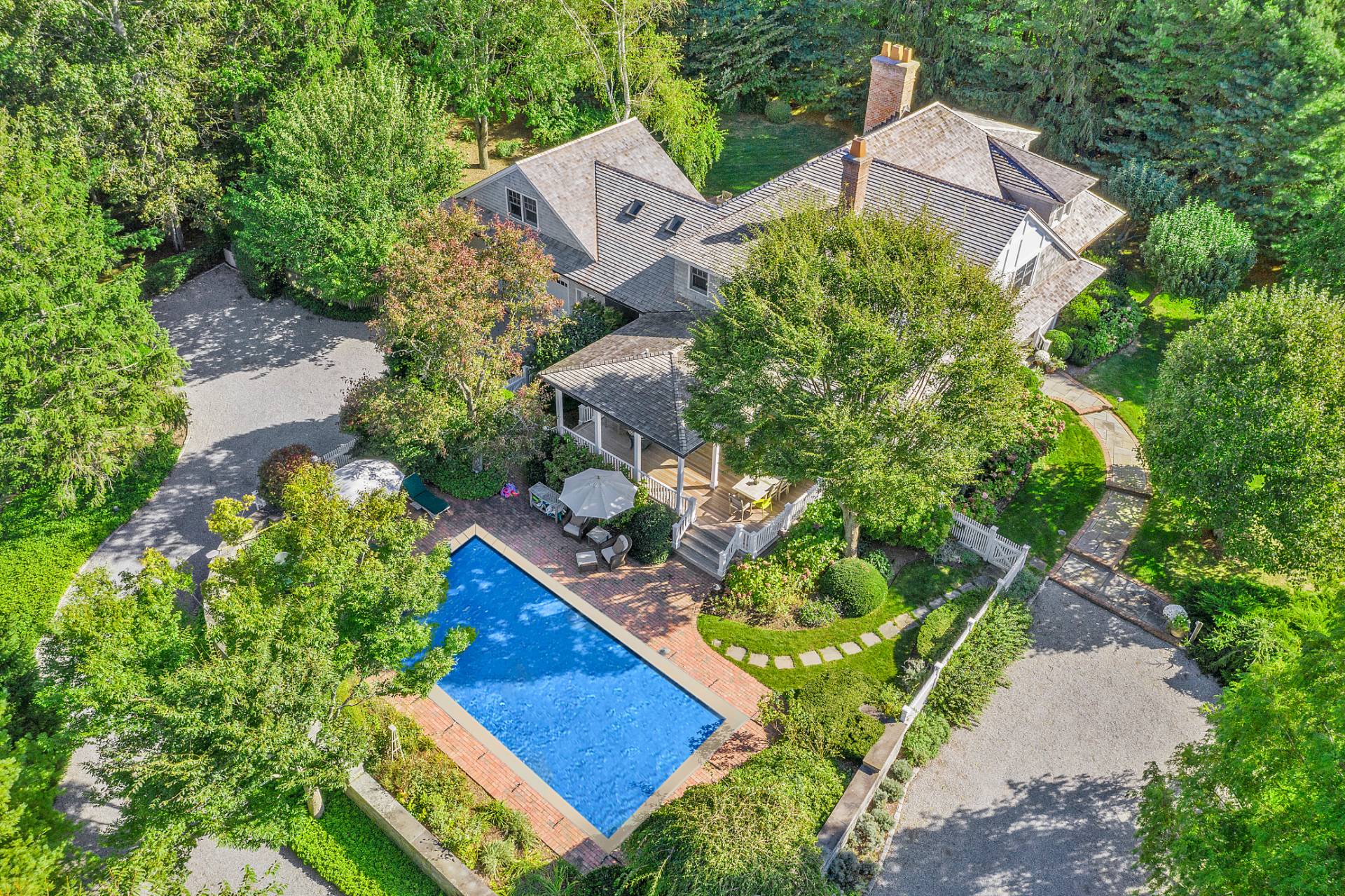 5 Mill Path Bridgehampton, NY 11963 - Photo 1 of 30 an aerial view of a house with a garden