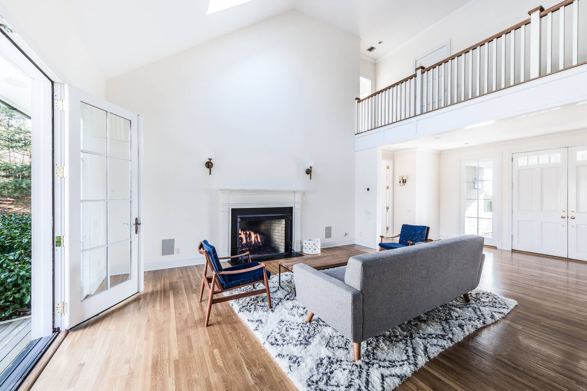 5 Mill Path Bridgehampton, NY 11963 - Photo 11 of 30 a living room with furniture and a fireplace