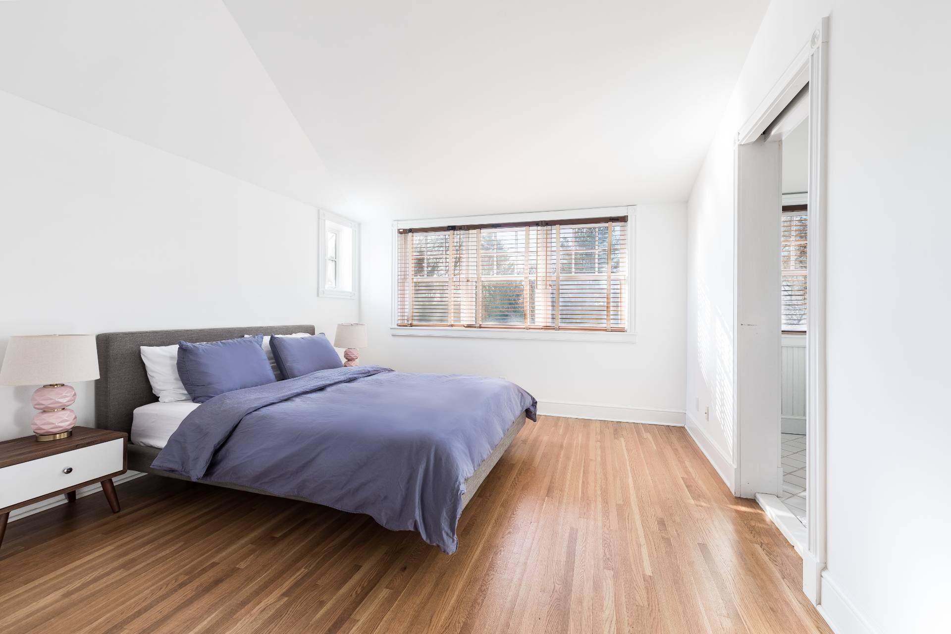 5 Mill Path Bridgehampton, NY 11963 - Photo 12 of 30 a bedroom with a bed and a window