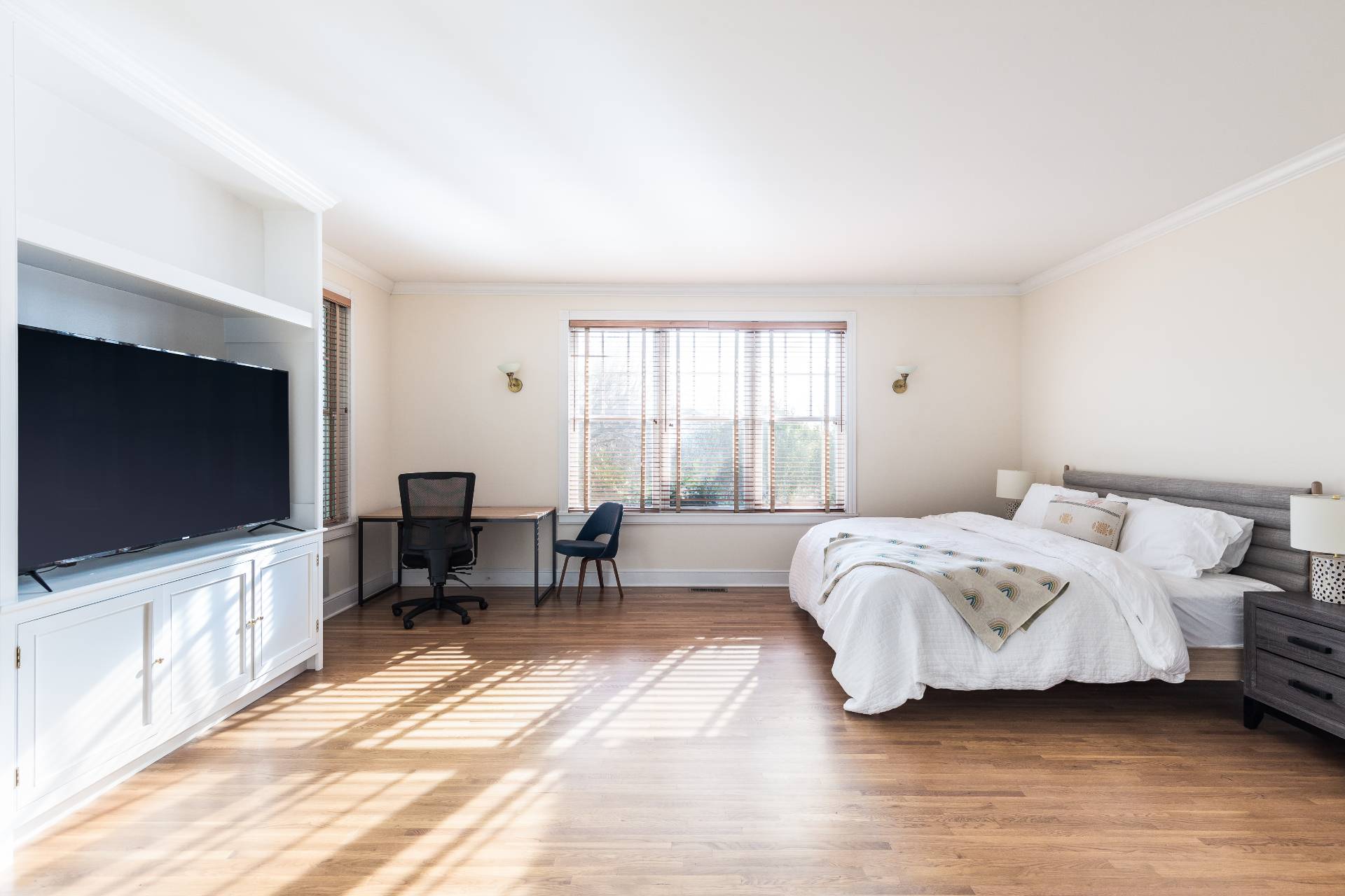 5 Mill Path Bridgehampton, NY 11963 - Photo 14 of 30 a bedroom with a bed and a flat screen tv