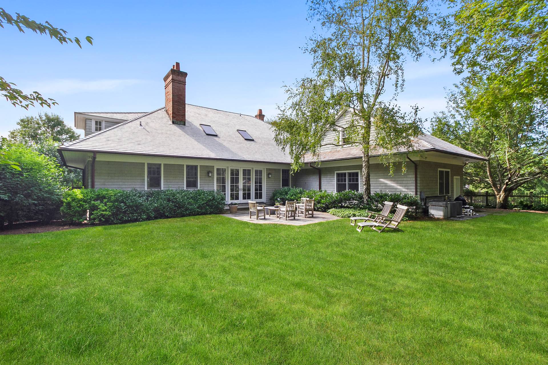 5 Mill Path Bridgehampton, NY 11963 - Photo 6 of 30 a front view of a house with yard patio and fire pit