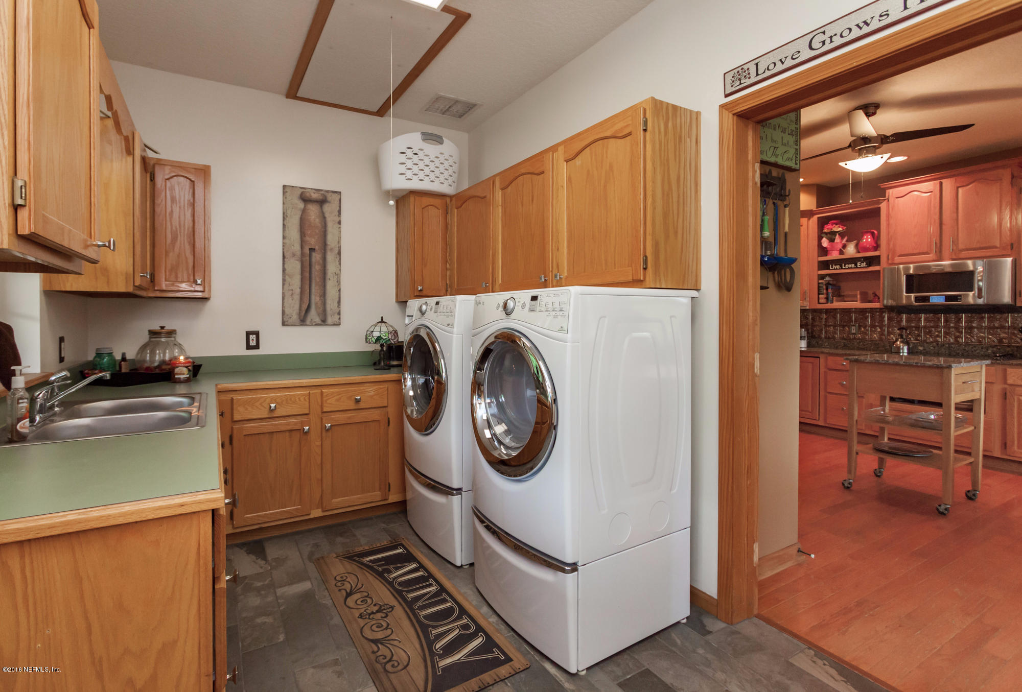 17111 Buckskin Road Hilliard, FL 32046 - Photo 25 of 72 25 storage cabs & sink