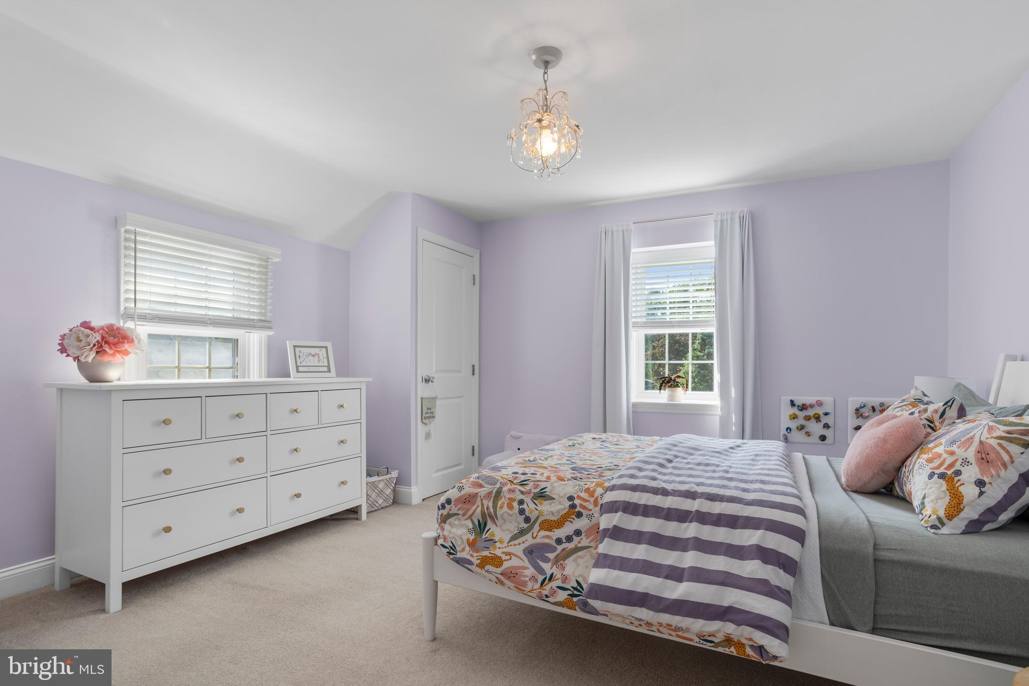 100 Shelburne Road Springfield, PA 19064 - Photo 16 of 31 a bedroom with a bed and a dresser