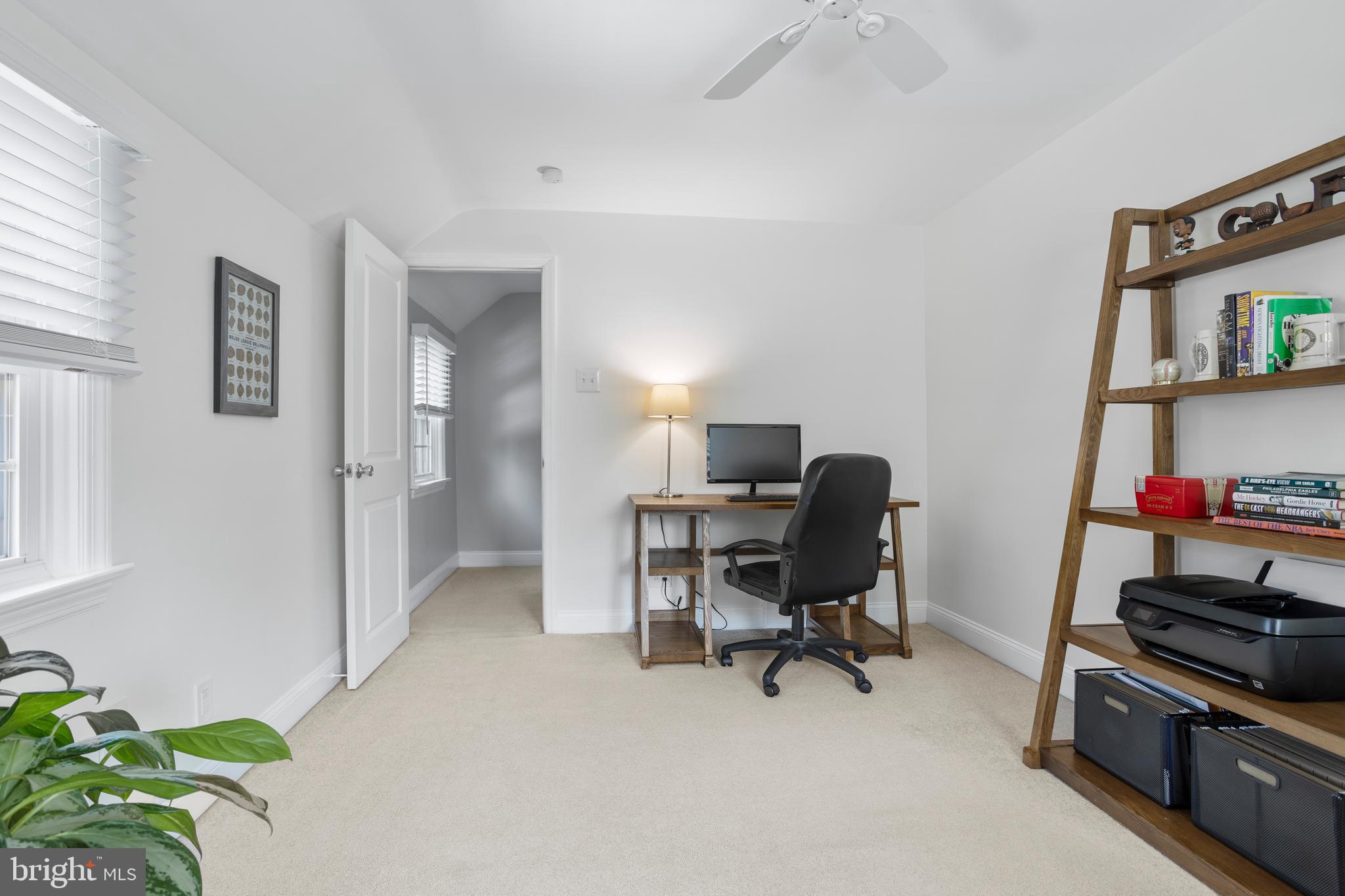 100 Shelburne Road Springfield, PA 19064 - Photo 19 of 31 a view of a workspace with furniture and a window