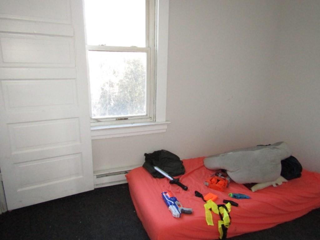 501 9th Street Freedom, PA 15042 - Photo 12 of 25 a bedroom with a bed and window