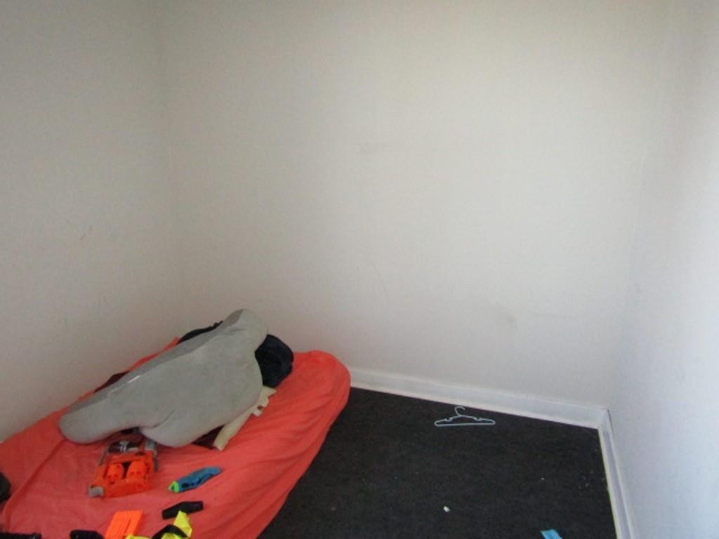 501 9th Street Freedom, PA 15042 - Photo 13 of 25 an empty room with a potted plant on the wall