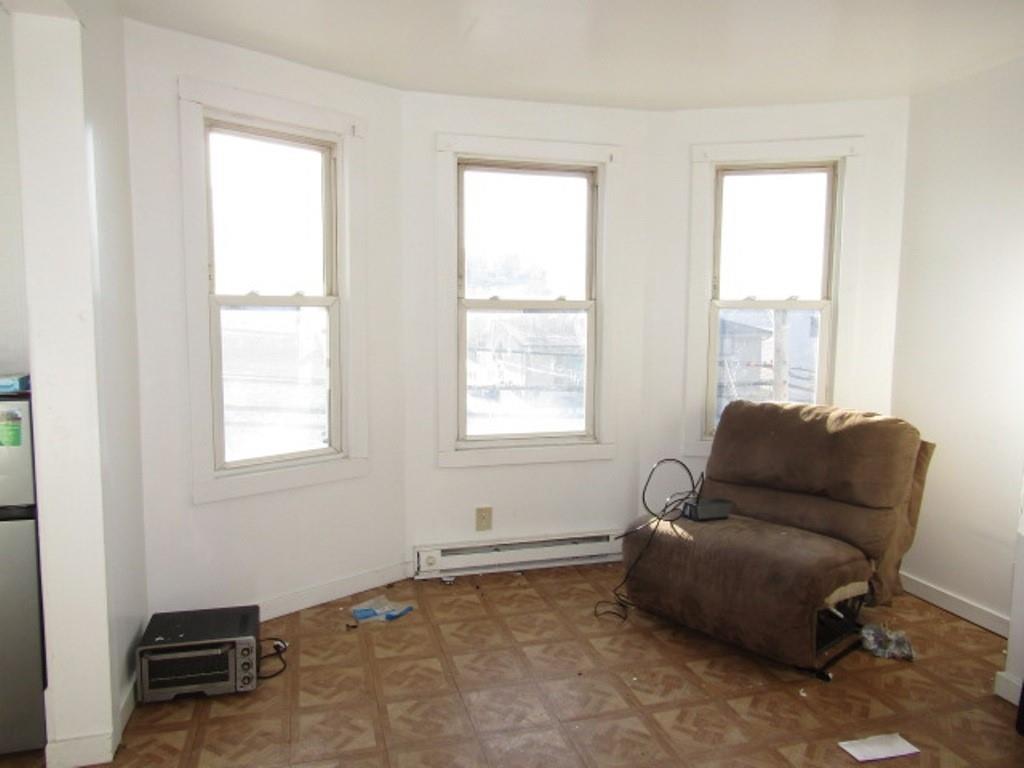 501 9th Street Freedom, PA 15042 - Photo 6 of 25 a living room with furniture and a window