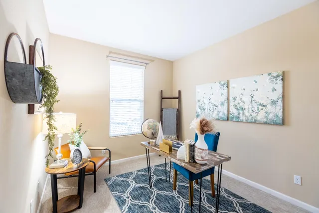 a view of a storage and utility room with washer and dryer
