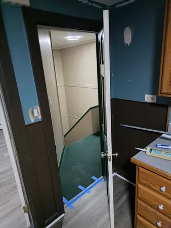 a view of storage and utility room with washer and dryer