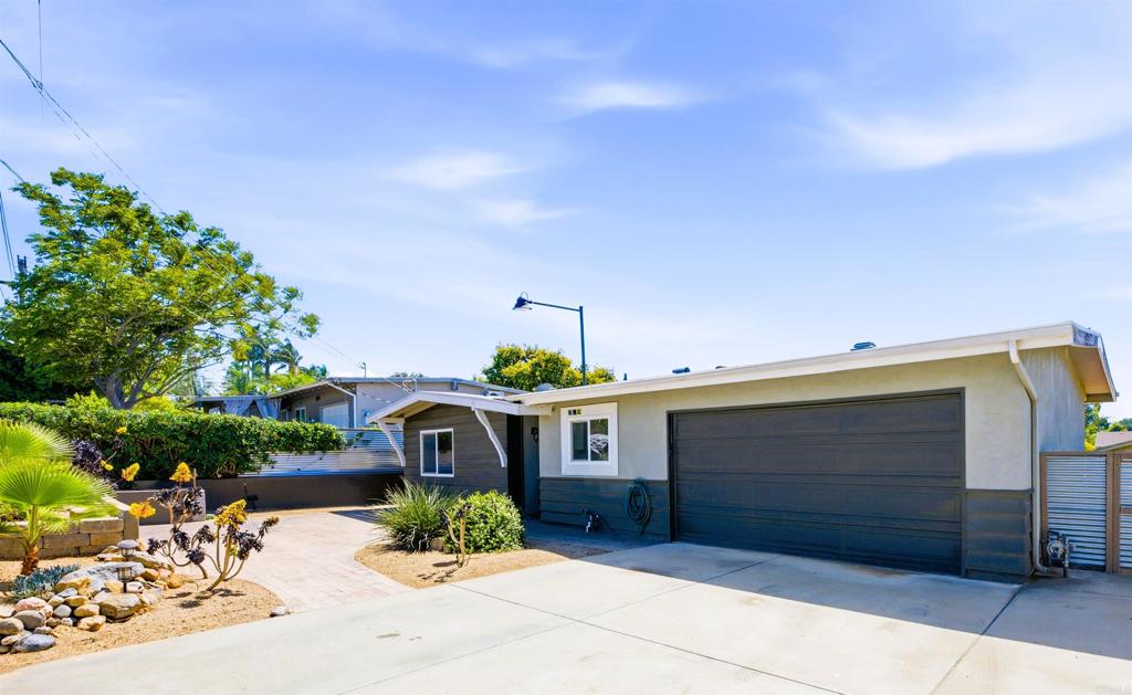 421 Hillcrest Lane Fallbrook, CA 92028 - Photo 2 of 32 a front view of a house with garden