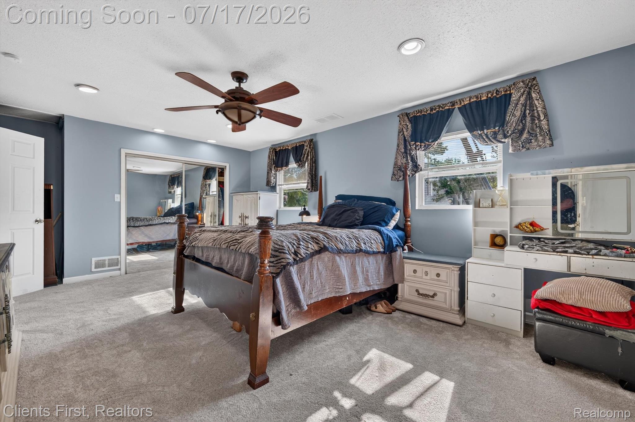 36852 Chase Street Romulus, MI 48174 - Photo 17 of 40 Carpeted room featuring a ceiling fan with light, recessed lighting, and a window with valance