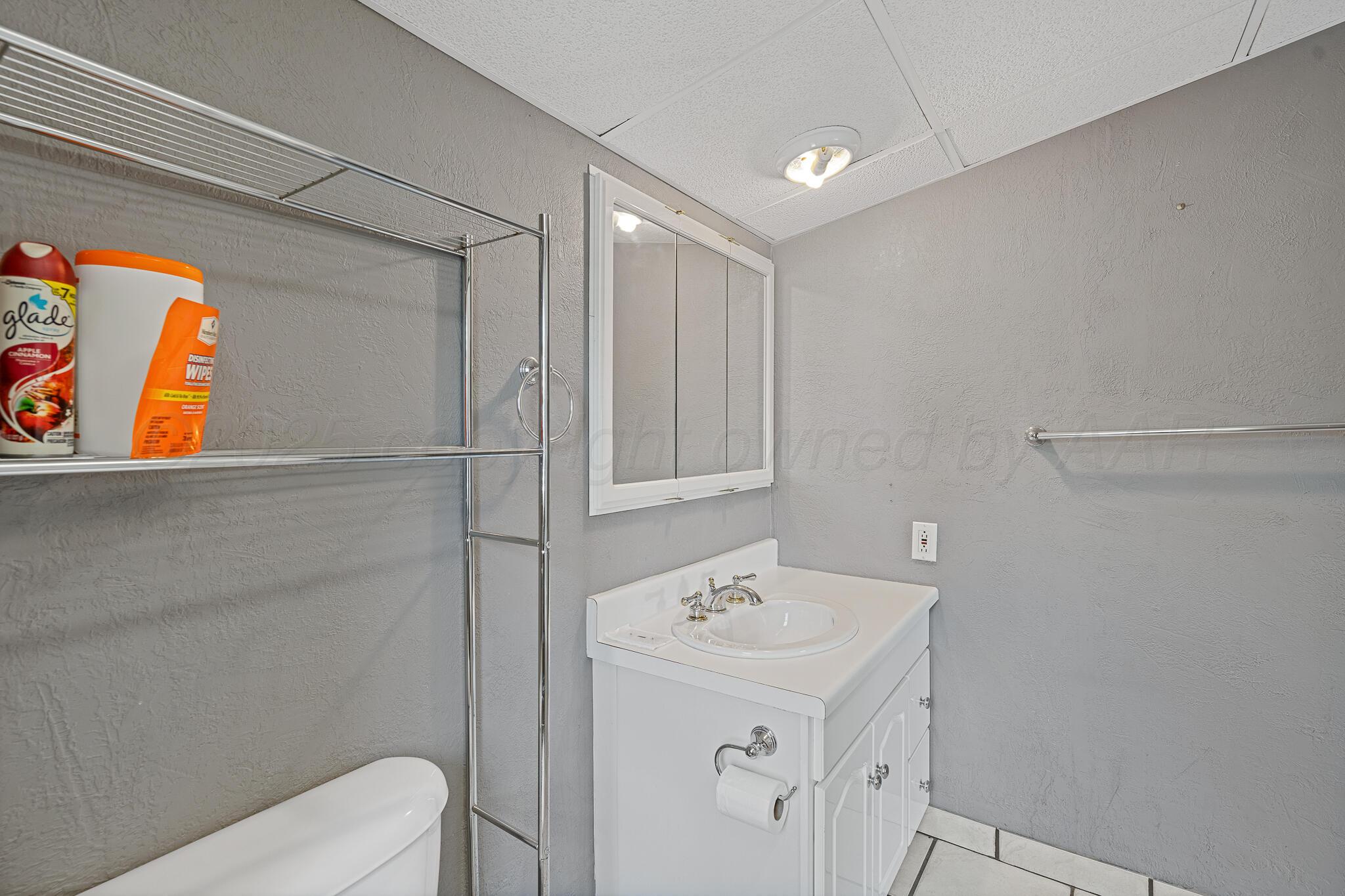 4103 Cline Road Amarillo, TX 79110 - Photo 12 of 18 Upstairs Bath View 1