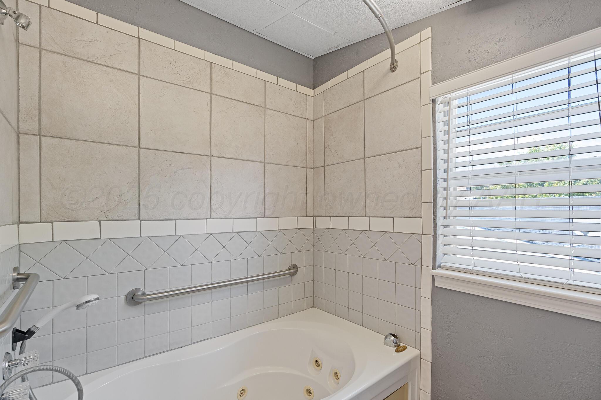 4103 Cline Road Amarillo, TX 79110 - Photo 13 of 18 Upstairs Bath View 2