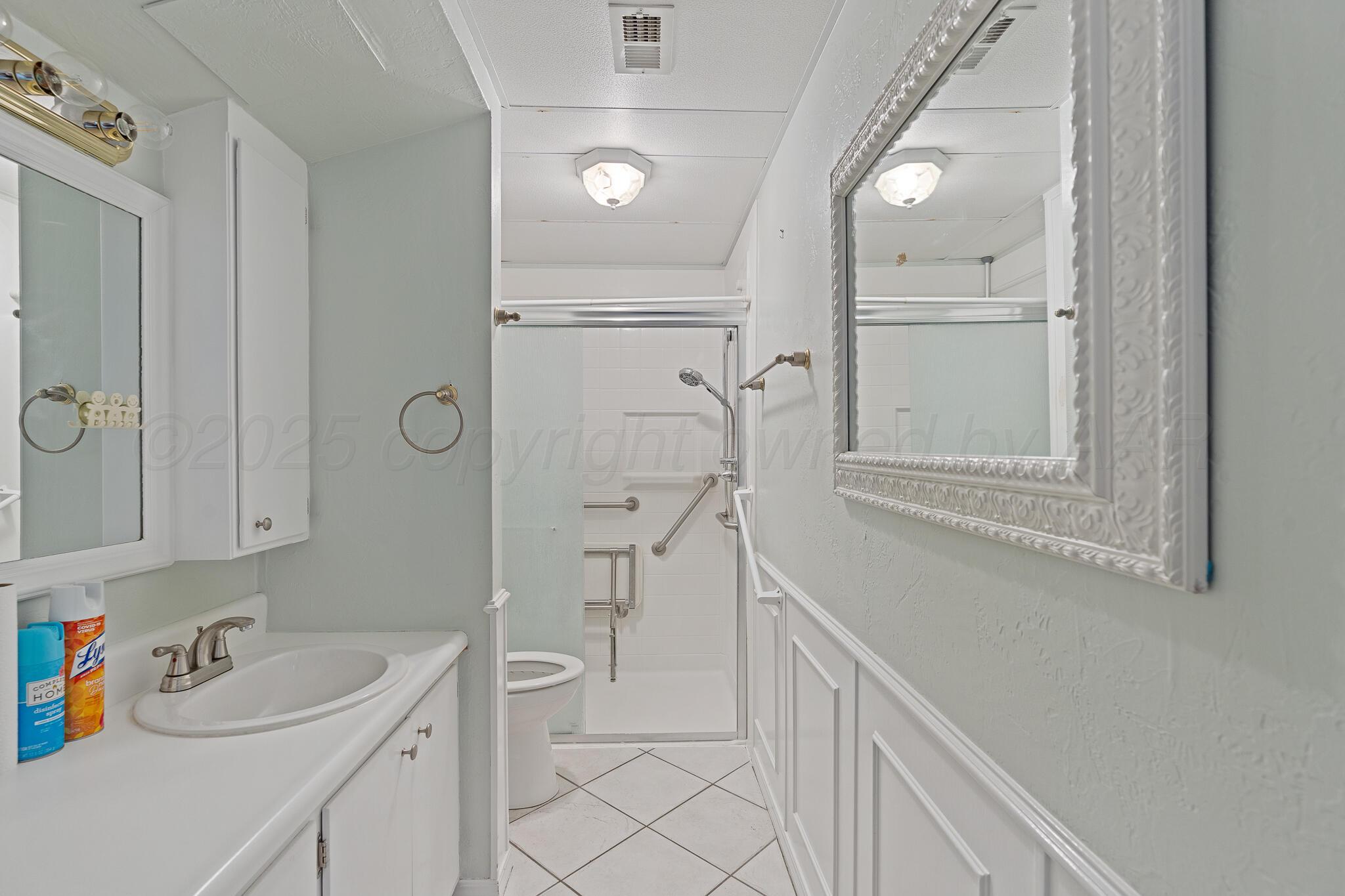 4103 Cline Road Amarillo, TX 79110 - Photo 17 of 18 Downstairs Bath