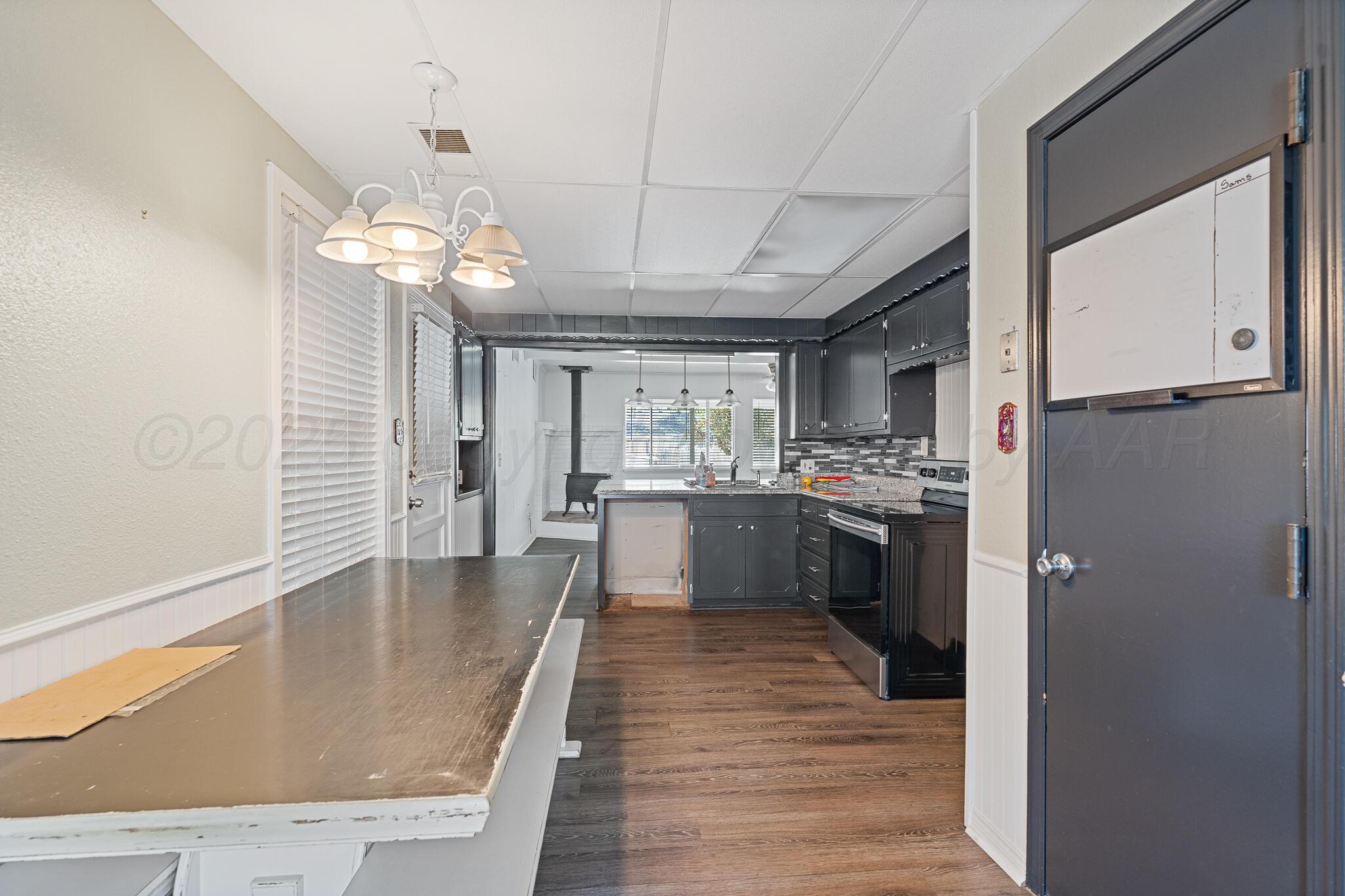 4103 Cline Road Amarillo, TX 79110 - Photo 6 of 18 Kitchen / Dining View 1