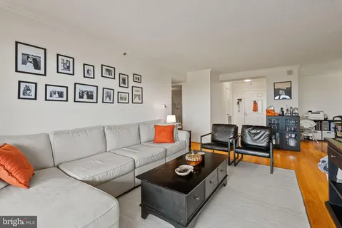 a kitchen with granite countertop a sink stainless steel appliances and cabinets