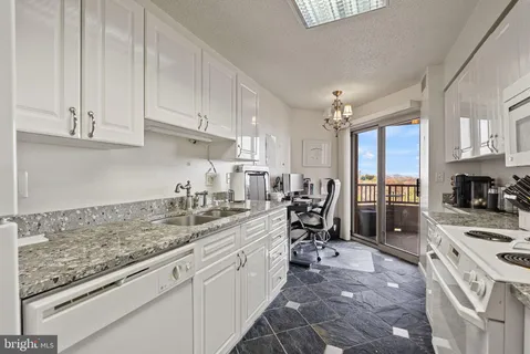 a bedroom with bed and window