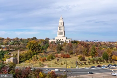 an aerial view of residential building and ocean view
