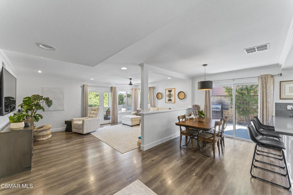3585 Woodhaven Street Simi Valley, CA 93063 - Photo 11 of 33 a living room with furniture and a wooden floor