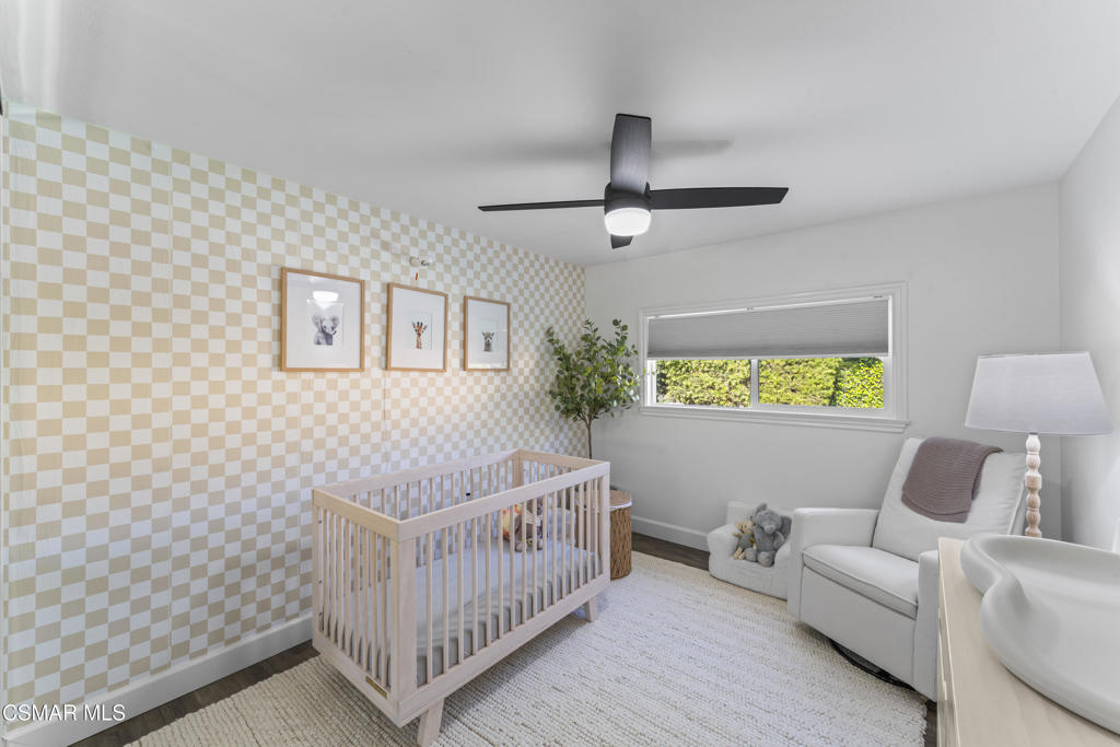 3585 Woodhaven Street Simi Valley, CA 93063 - Photo 20 of 33 a living room with furniture and a table