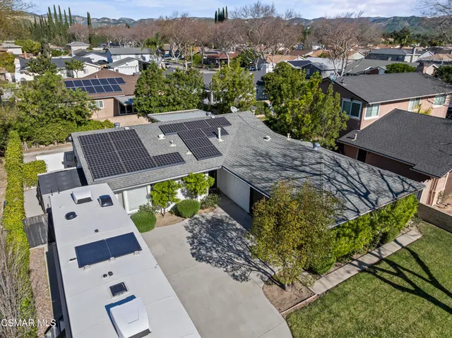 an aerial view of a house with a garden
