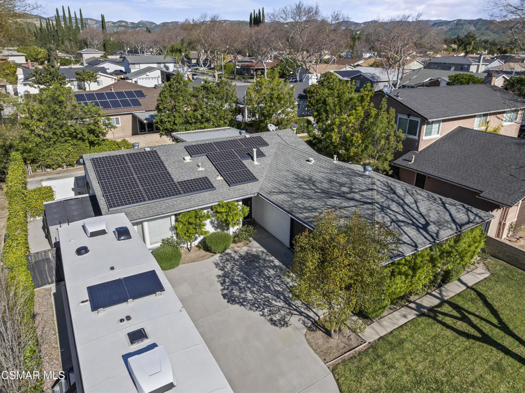 3585 Woodhaven Street Simi Valley, CA 93063 - Photo 2 of 33 an aerial view of a house with a garden